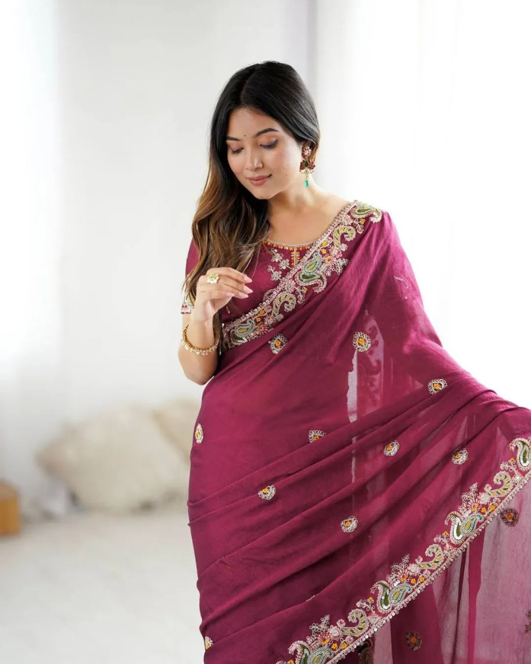 Graceful Maroon Georgette Saree with Intricate Embroidery and Designer Blouse