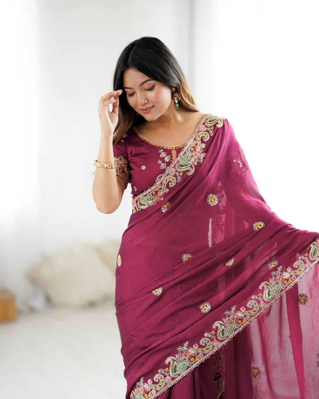 Graceful Maroon Georgette Saree with Intricate Embroidery and Designer Blouse