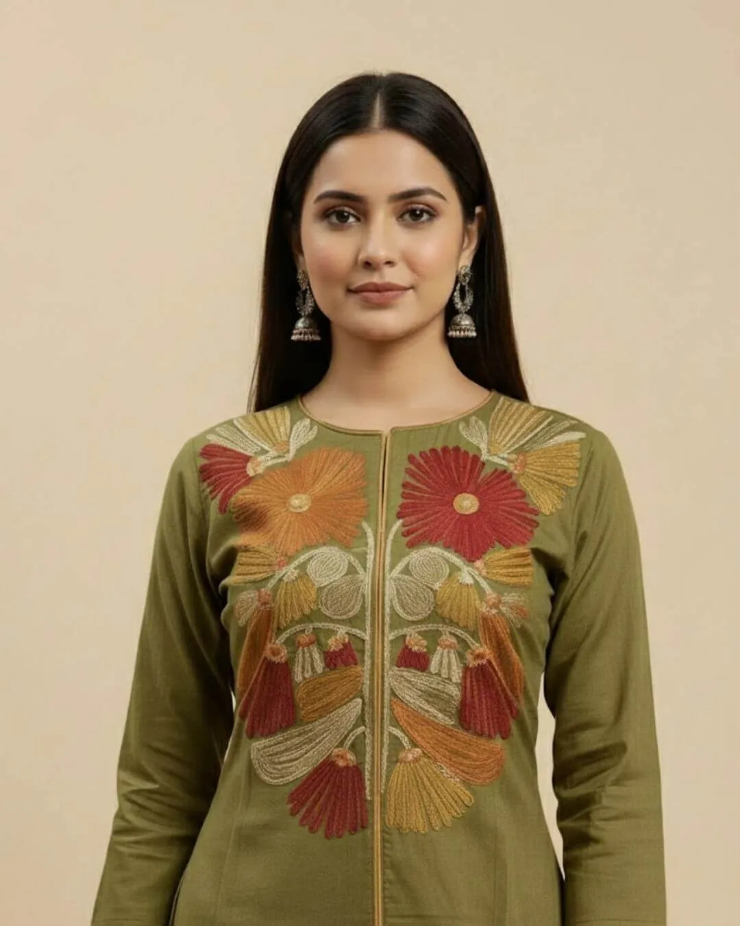 Woman wearing a Floral Printed Green Cotton Suit Set traditional outfit with floral patterns on a beige background