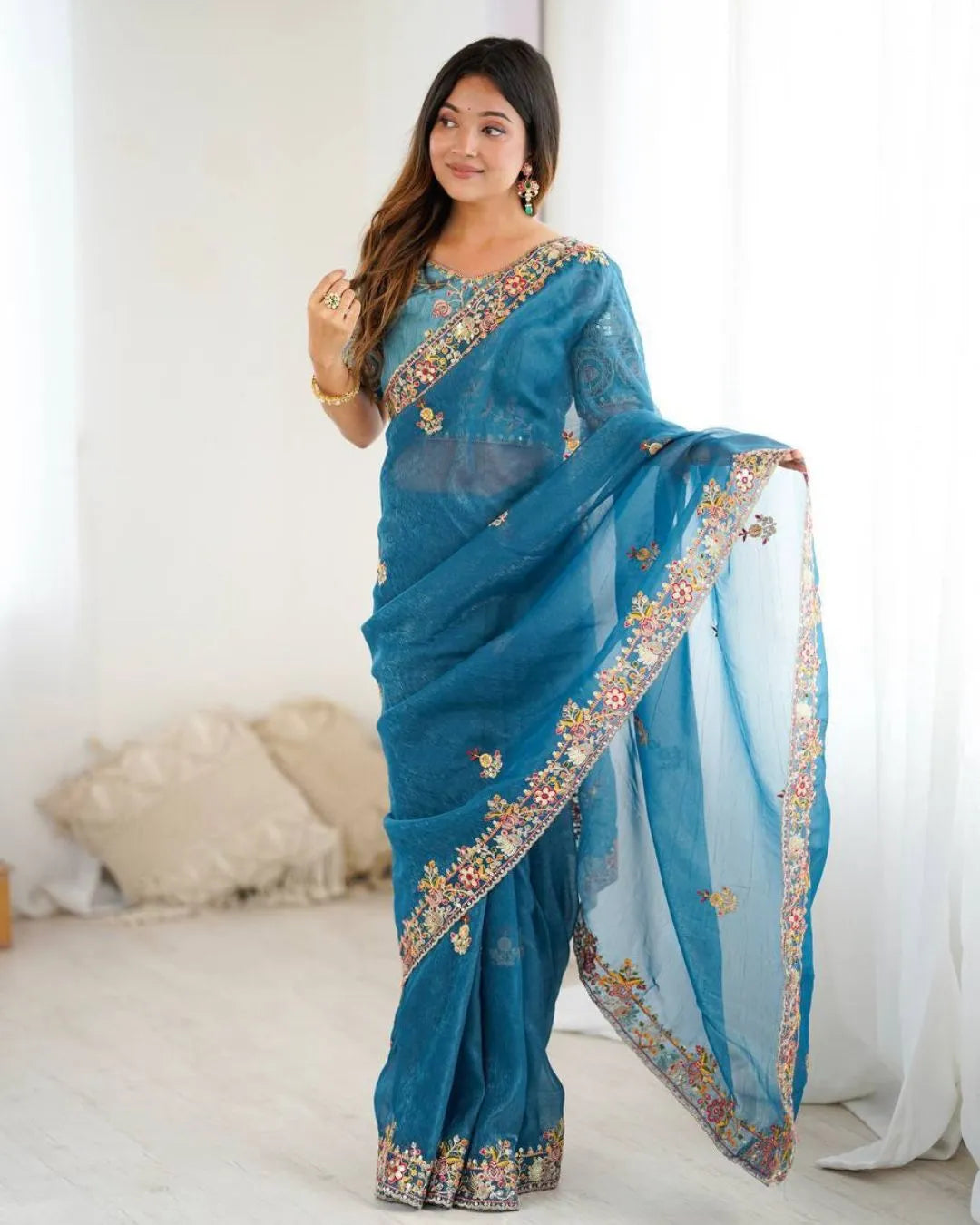 Elegant Teal Blue Organza Saree with Floral Embroidery and Designer Blouse