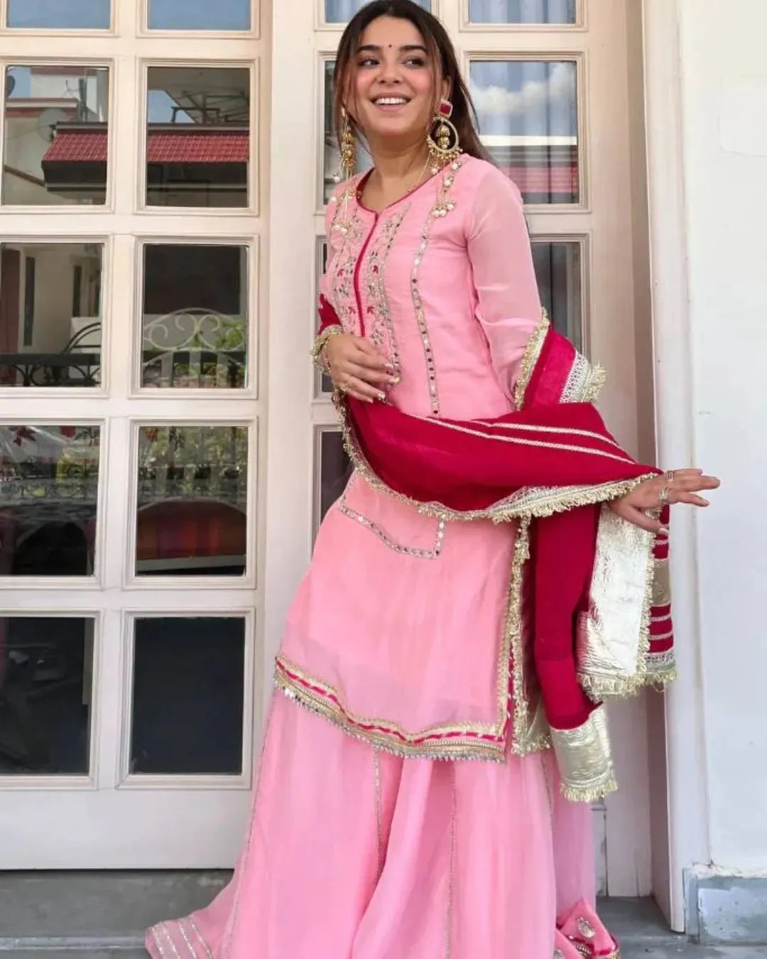 Exude Graceful Festive Glamour in Our Baby Pink Organza Sharara Set