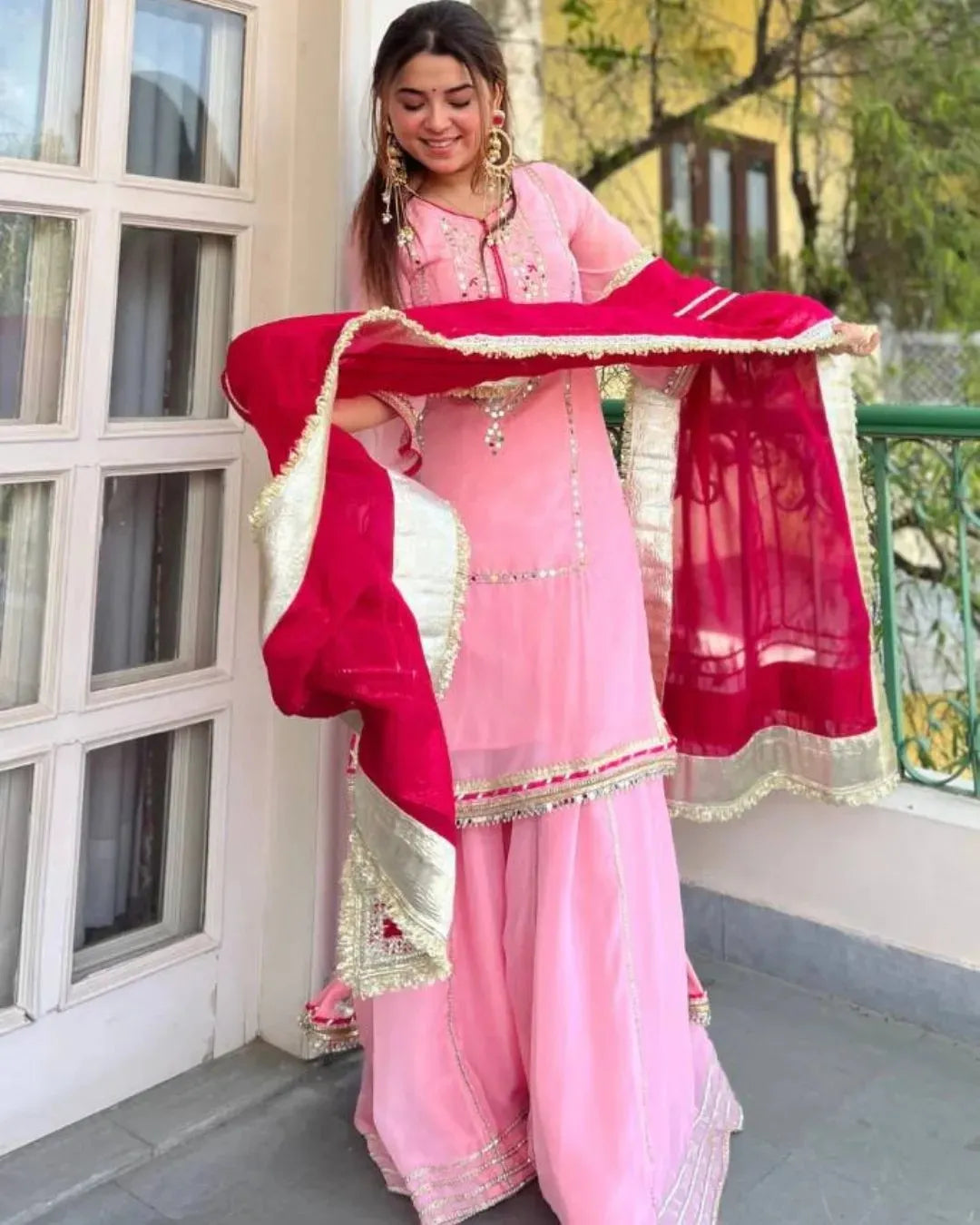 Exude Graceful Festive Glamour in Our Baby Pink Organza Sharara Set