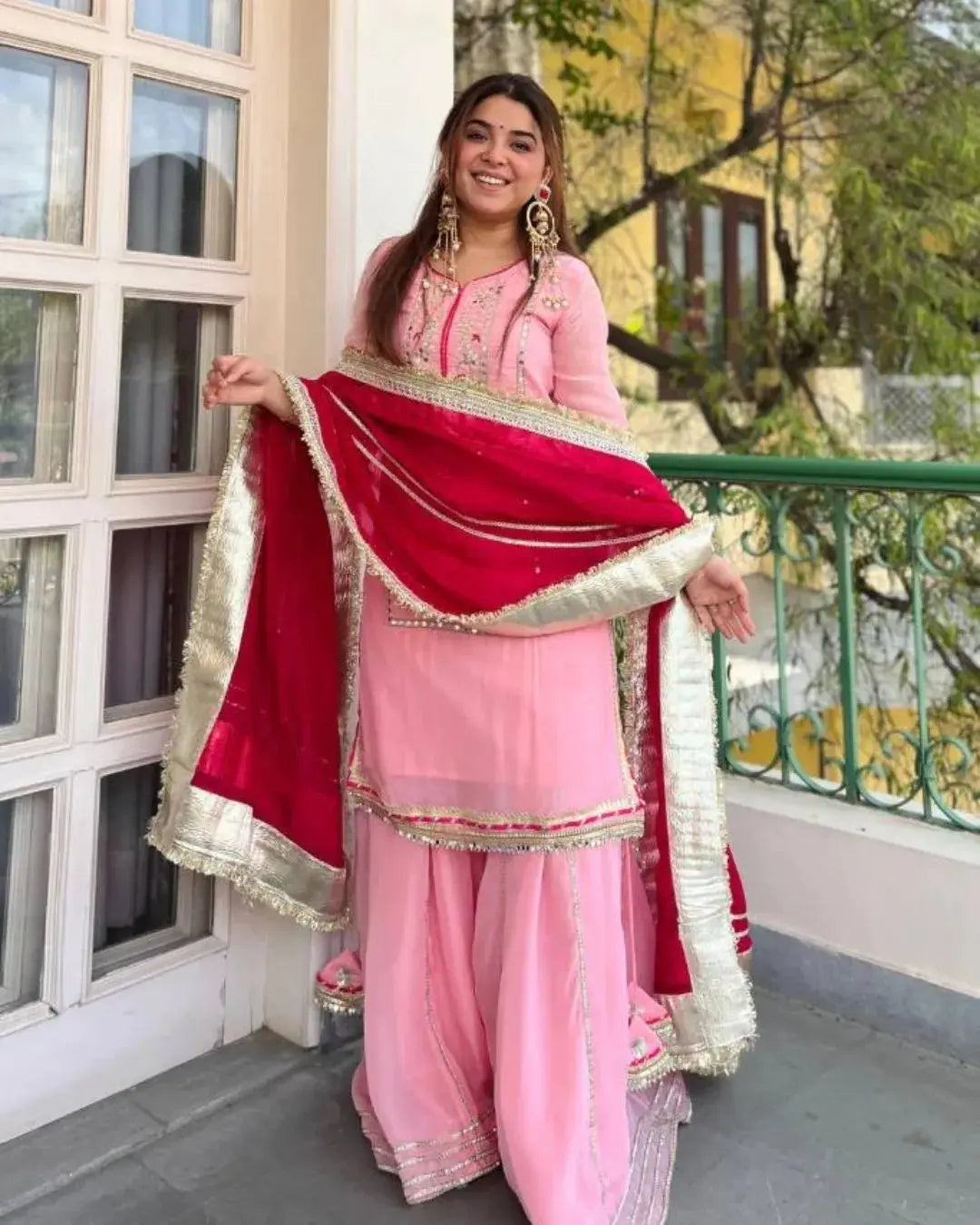 Exude Graceful Festive Glamour in Our Baby Pink Organza Sharara Set