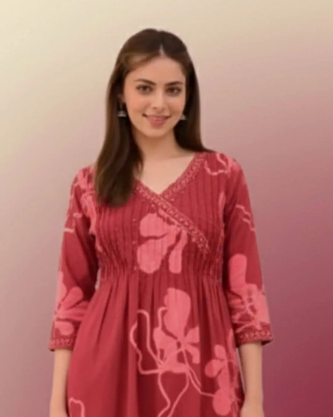 Woman wearing a Printed Cotton Anarkali Suit With Dupatta against a gradient background